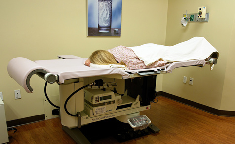 Womensctr Woman Lying Face Down in Medical Bed